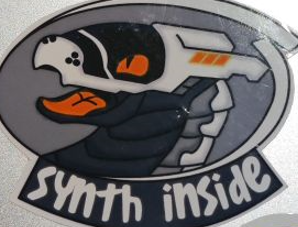 Sticker depicting a Synth with written "Synth Inside"
