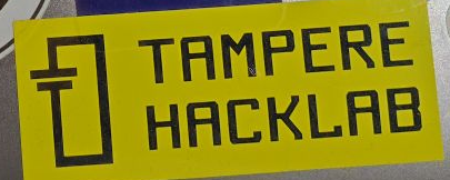 Yellow sticker with a text saying "Tampere Hacklab"